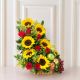 ramo de rosas y girasoles y frutas con canasta o base de madera 